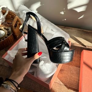 NWT black snakeskin platform heels with bow detailing